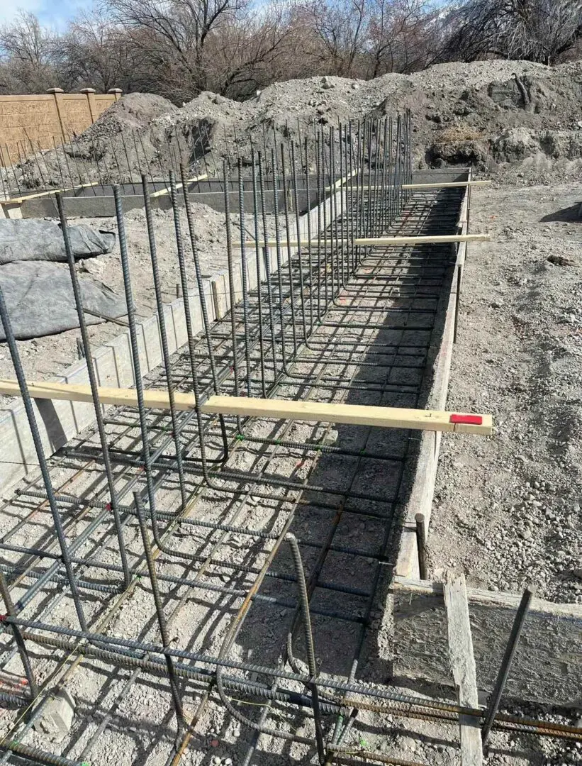 A construction site with iron rods layed